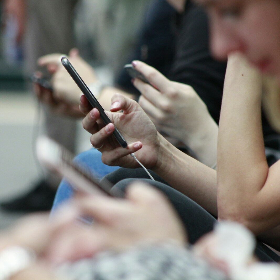 person holding black phone